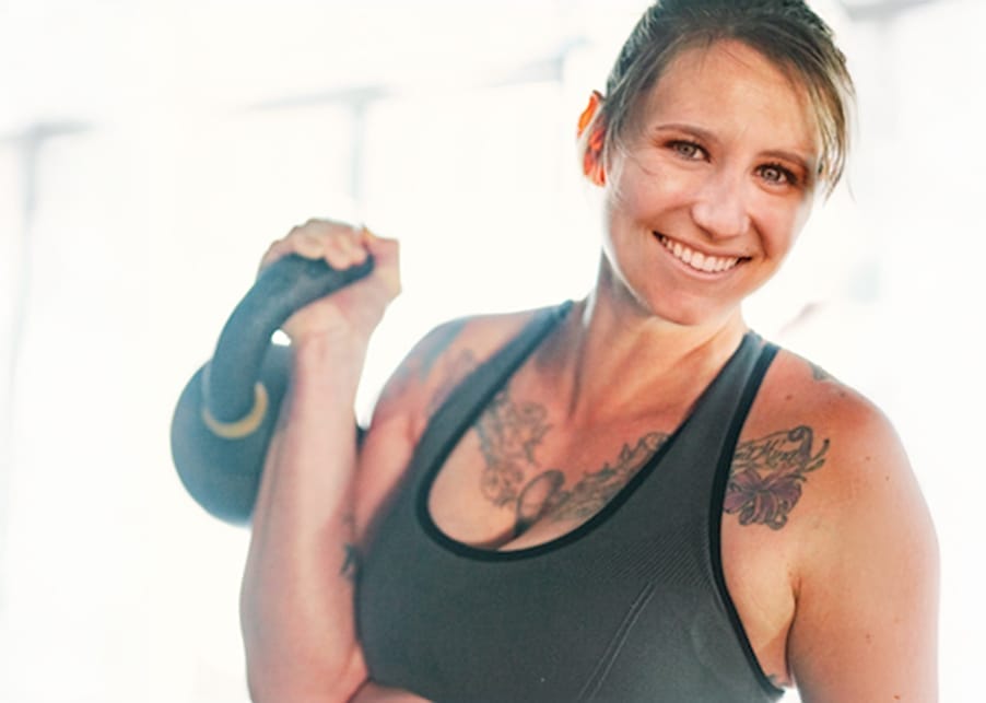 Marta holding the kettlebell